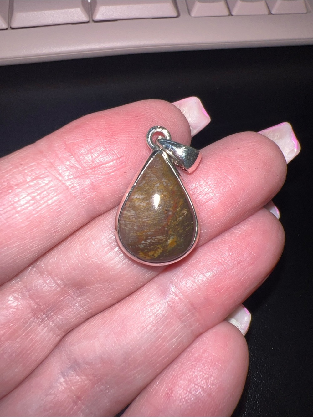 Sterling Silver Teardrop grade A Petrified Wood Pendant from Alberta
